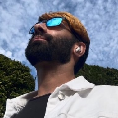 Naeem Shabir outdoors, wearing sunglasses